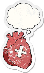 cartoon heart and thought bubble as a distressed worn sticker
