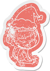 cartoon distressed sticker of a pretty astronaut girl sitting waiting wearing santa hat