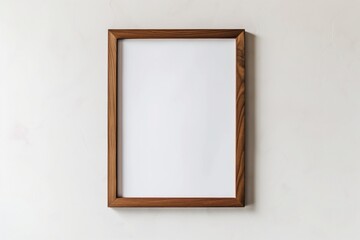Wooden frame mockup on white wall. Poster mockup. Clean, modern, minimal frame. Indoor interior