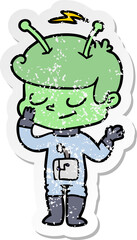 distressed sticker of a friendly cartoon spaceman