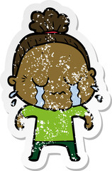 distressed sticker of a cartoon crying old lady
