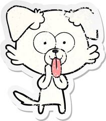 distressed sticker of a cartoon dog with tongue sticking out