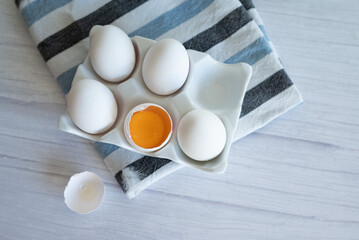 eggs ready for cooking on light kitchen table, hight key