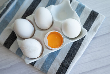 eggs ready for cooking on light kitchen table, hight key