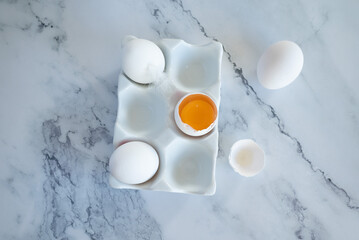 eggs ready for cooking on light kitchen table, hight key