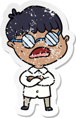 distressed sticker of a cartoon boy with crossed arms wearing spectacles