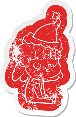 cartoon distressed sticker of a indifferent woman wearing santa hat