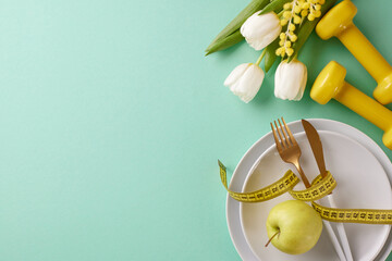 Greens and growth: Nourishing your body in the springtime. Top view photo of plates, cutlery,...
