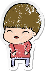 distressed sticker of a happy cartoon boy