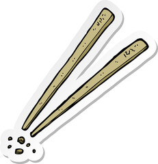 sticker of a cartoon chopsticks