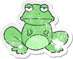 retro distressed sticker of a cartoon frog