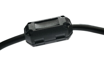 Close-up of a ferrite bead inductor on isolated white background  
