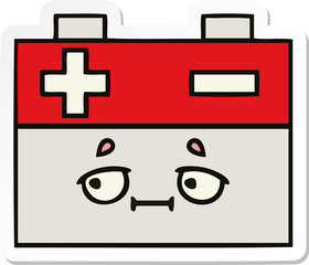 Obraz premium sticker of a cute cartoon car battery