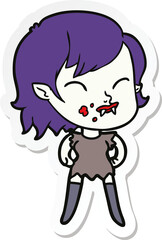 sticker of a cartoon vampire girl with blood on cheek