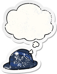 cartoon bowler hat and thought bubble as a distressed worn sticker