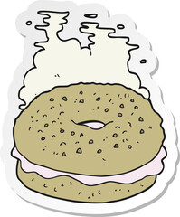 sticker of a cartoon bagel