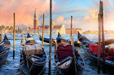 Venice, Italy. View at San Giorgio Maggiore from the Marco Square with Venetian gondolas moored by...