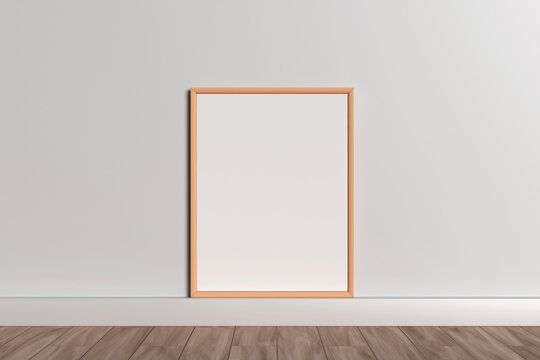 Blank wooden picture frame template to place pictures or text inside on a wooden table.