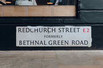 Street name sign on Redchurch Street in East London, UK.