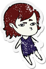 distressed sticker of a cartoon vampire girl