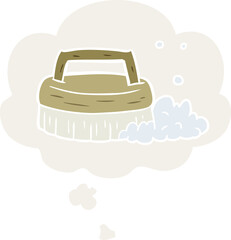 cartoon scrubbing brush and thought bubble in retro style