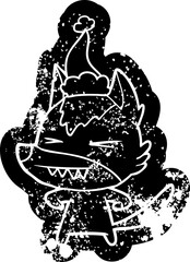 angry wolf cartoon distressed icon of a wearing santa hat