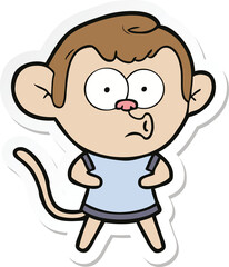 sticker of a cartoon surprised monkey