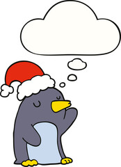 cute cartoon christmas penguin and thought bubble