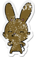 distressed sticker of a curious bunny cartoon