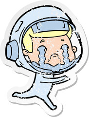 distressed sticker of a cartoon crying astronaut