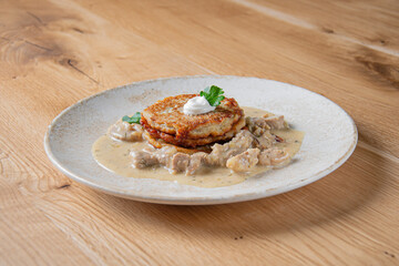 Potato pancakes with mushroom sauce