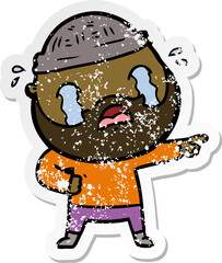 distressed sticker of a cartoon bearded man crying