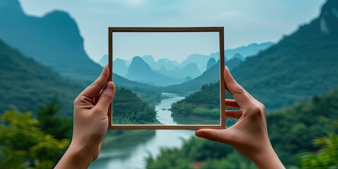 Nature Landscape Frames View, Hand Delicately Holds Imaginary Frame! Scene Captures Beauty of Mountains, Rivers, and Skies - Soft Natural Light 