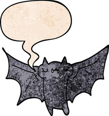 cute cartoon halloween bat and speech bubble in retro texture style