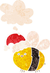 cute cartoon bee wearing christmas hat and thought bubble in retro textured style