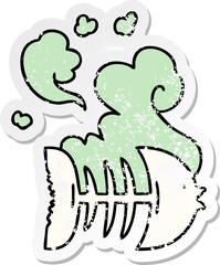 distressed sticker of a quirky hand drawn cartoon dead fish