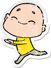 distressed sticker of a happy cartoon bald man