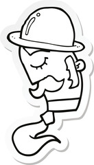 sticker of a cartoon man wearing hat