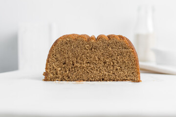 Homemade pound cake loaf on a white table, fresh brown sugar loaf cake on a white background