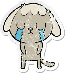 distressed sticker of a cute cartoon dog crying