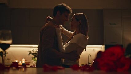Romantic spouses dancing kitchen feeling closeness close up. Couple evening date