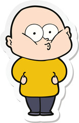 sticker of a cartoon bald man staring