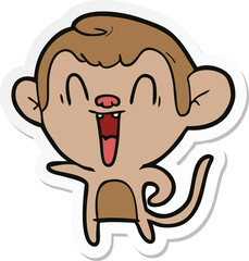 sticker of a cartoon laughing monkey