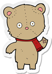 Naklejka premium sticker of a cartoon waving teddy bear