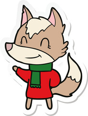 sticker of a friendly cartoon wolf in winter clothes
