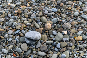Fototapeta na wymiar sea ​​pebbles by the Mediterranean sea on a winter day in Cyprus 2