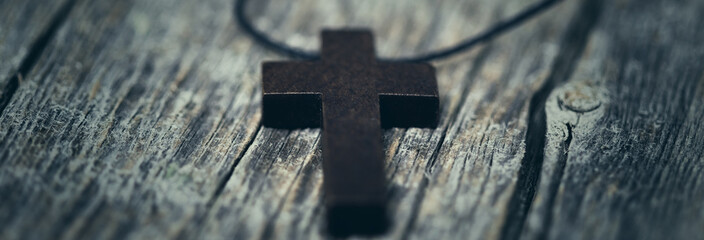 Wooden cross in table