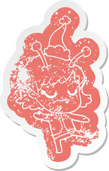 smiling alien girl cartoon distressed sticker of a wearing santa hat