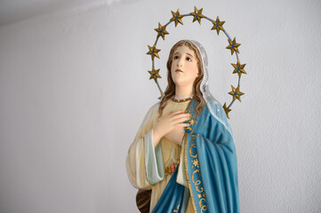Statue of the Virgin Mary. Igreja de Nossa Senhora de Fátima (Church of Our Lady of Fatima) – Bairro Padre Cruz, Lisbon, Portugal. - obrazy, fototapety, plakaty