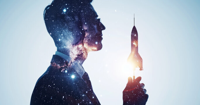 Double exposure of a businessman holding a rocket and a star. Rising, success, physics mathematics. Space, exploration and science concept.